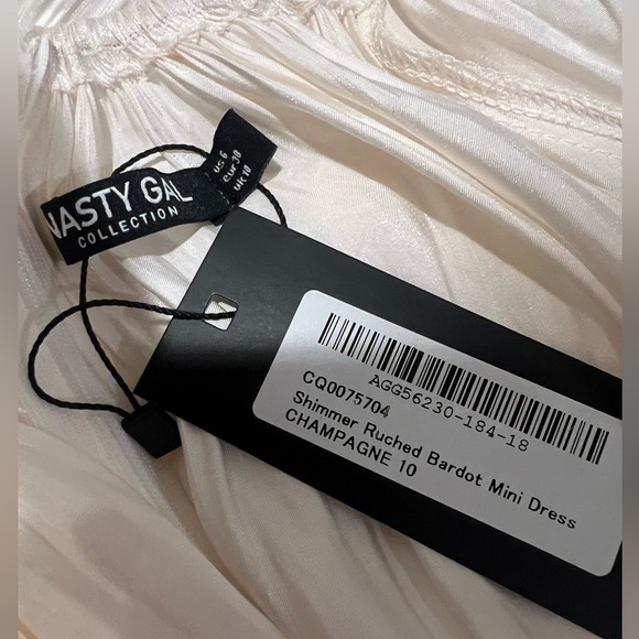 Shimmery Bardot style off the shoulder mini dress. - Picture 6 of 7